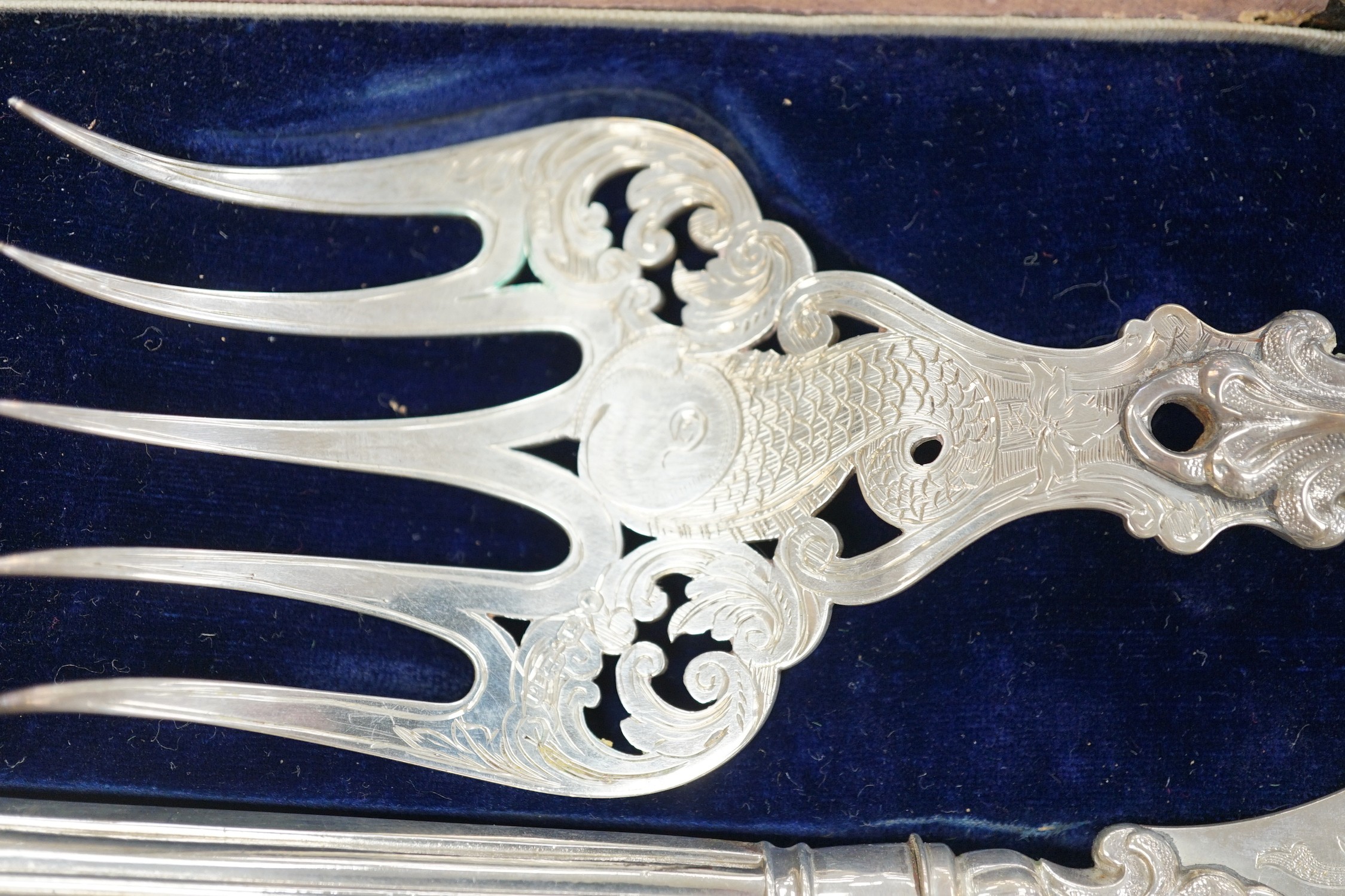 A cased pair of Victorian silver thread pattern fish servers, Hilliard & Thomason, Birmingham, 1864, (the case a.f), knife 32.9cm.